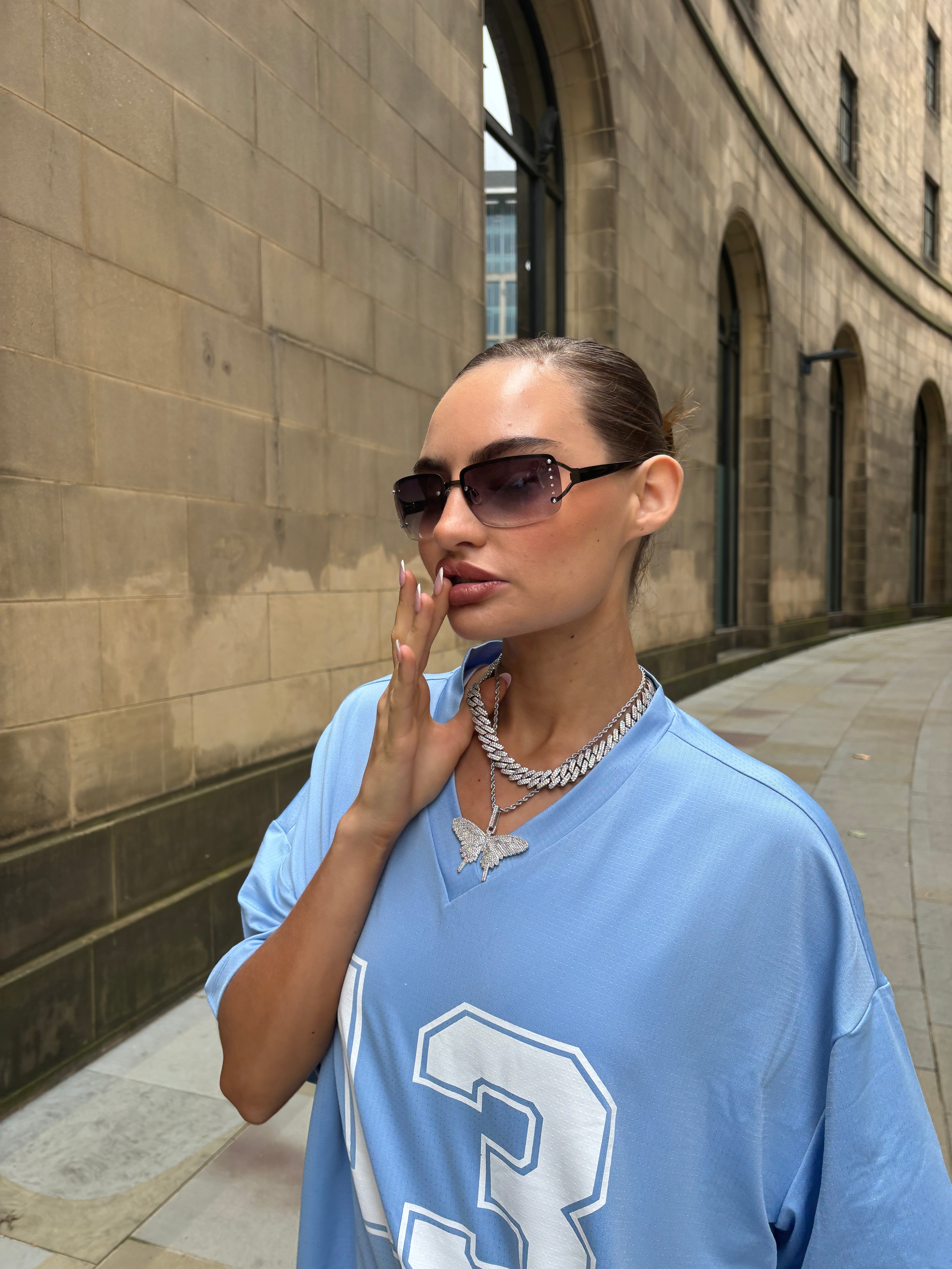 Female_model_wearing_2_white_gold_tyresse_necklaces